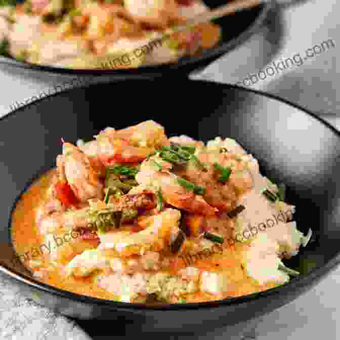 A Bowl Of Creamy Grits Topped With Sauteed Shrimp And A Sprinkling Of Chives Southern Cornmeal Grits Cookbook: Cornbread Polenta Casseroles More (Southern Cooking Recipes)