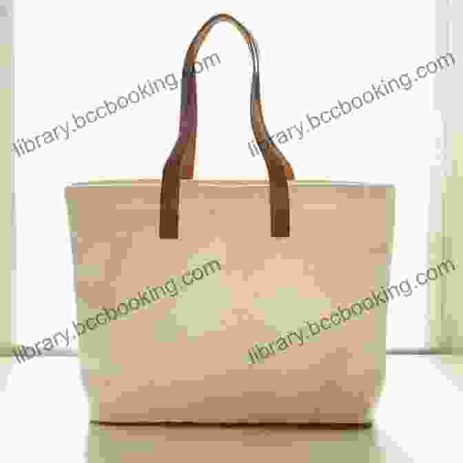 A Large Tote Bag In Canvas With Leather Handles. Bags: The Modern Classics: Clutches Hobos Satchels More
