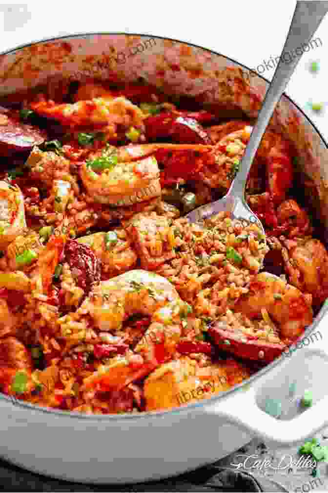 A Vibrant Skillet Of Creole Jambalaya, Featuring Plump Shrimp, Tender Chicken, Andouille Sausage, And Fragrant Vegetables Simmering In A Flavorful Broth. Crescent City Cooking: Unforgettable Recipes From Susan Spicer S New Orleans: A Cookbook