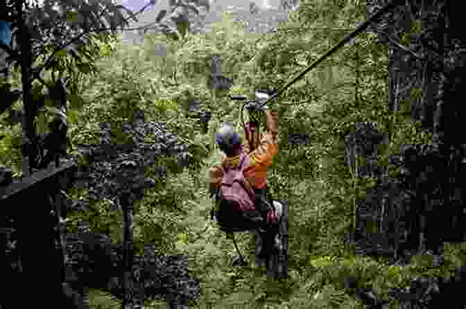 An Adventurous Couple Zip Lining Through The Belizean Rainforest, Experiencing The Thrill Of Soaring Above The Lush Canopy. Lan Sluder S Guide To Belize