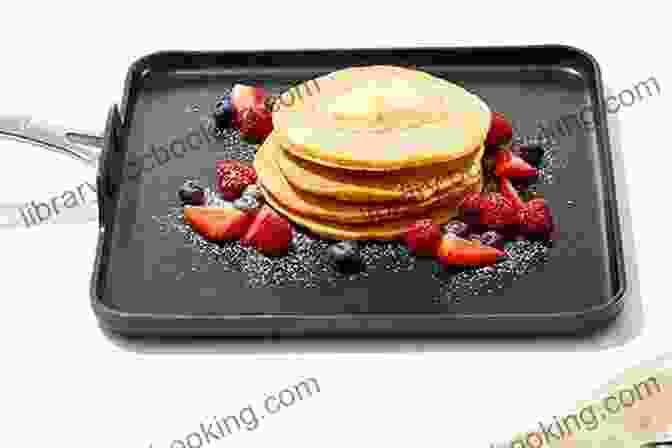 Image Of A Hot Griddle With Pancakes Cooking On It Pancake Recipes: Easy And From Scratch