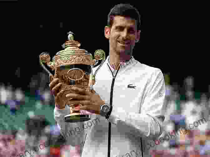 Novak Djokovic As A Young Tennis Player, Holding A Trophy Novak Djokovic: Biography Of Serbian Professional Tennis Player Covid 19 Vaccine Controversy Australian Open And More