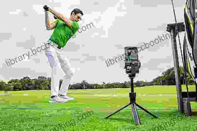 Professional Golfer Analyzing Golf Swing Using Technology EVIDENCE BASED GOLF